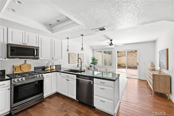Interior, Kitchen, Pendant Lights, Recessed Lighting, Stainless Steel Appliances, Wood Texture Flooring