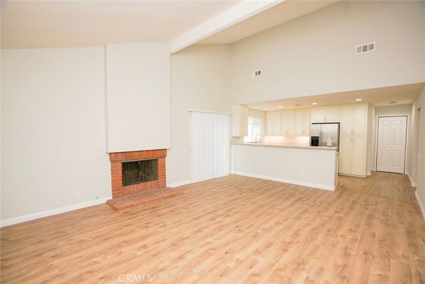 Empty room, Fireplace, Interior, Kitchen, Recessed Lighting, Wood Texture Flooring