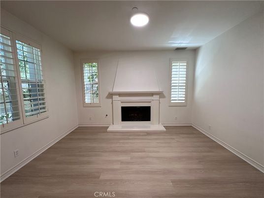 Empty room, Fireplace, Interior, Recessed Lighting, Wood Texture Flooring