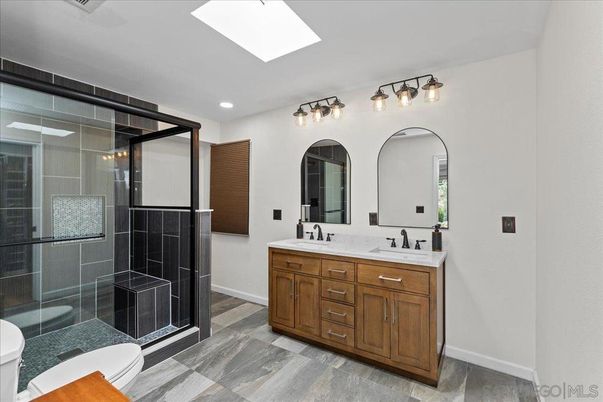 Bathroom, Dual Sink Vanities, Glass Shower, Interior, Recessed Lighting, Wood Texture Flooring