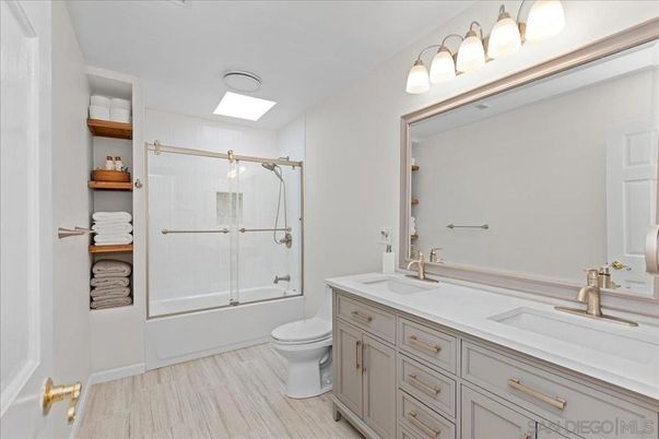 Bathroom, Dual Sink Vanities, Glass Shower, Interior, Wood Texture Flooring