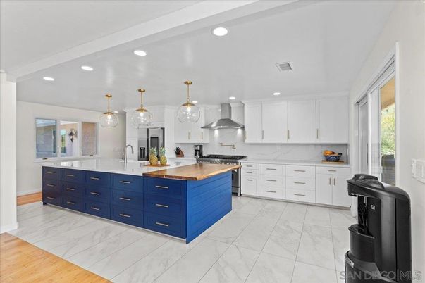Interior, Kitchen, Marble, Pendant Lights, Recessed Lighting, Stainless Steel Appliances, Wood Texture Flooring