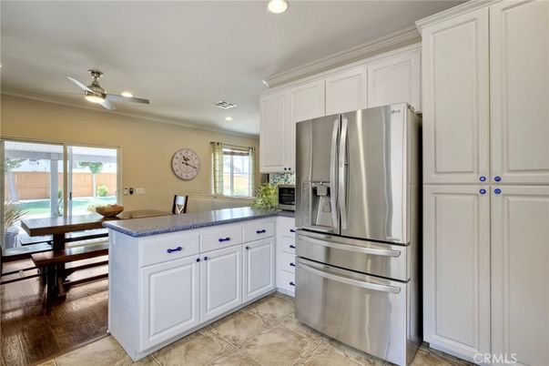 Dining room, Interior, Kitchen, Recessed Lighting, Stainless Steel Appliances, Wood Texture Flooring