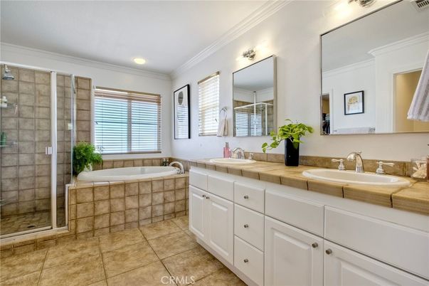 Bathroom, Dual Sink Vanities, Glass Shower, Interior, Recessed Lighting, Tile Countertops