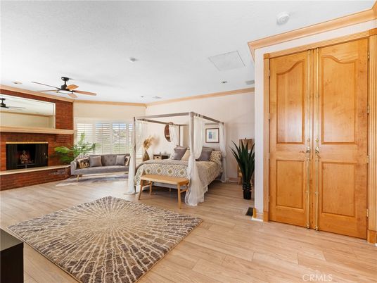 Bedroom, Fireplace, Interior, Living room, Recessed Lighting, Wood Texture Flooring
