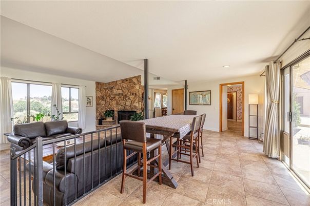 Dining room, Fireplace, Interior, Living room, Recessed Lighting, Stone Walls