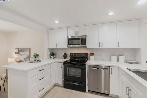 Interior, Kitchen, Recessed Lighting, Stainless Steel Appliances, Wood Texture Flooring