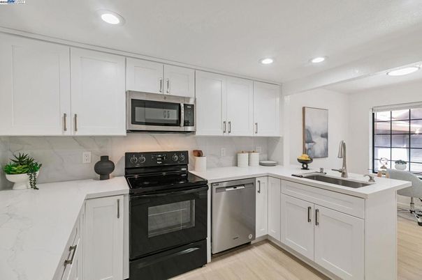 Interior, Kitchen, Recessed Lighting, Stainless Steel Appliances, Wood Texture Flooring