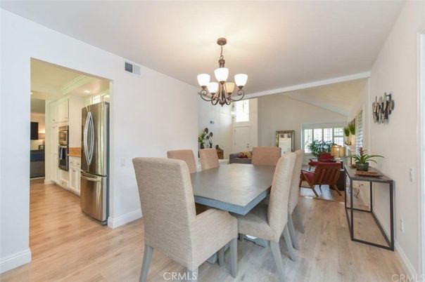 Chandelier, Dining room, Interior, Kitchen, Stainless Steel Appliances, Wood Texture Flooring