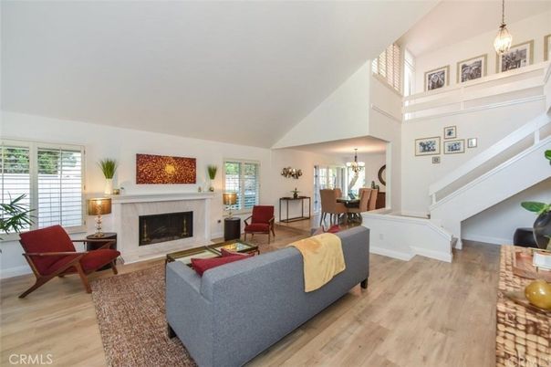 Chandelier, Dining room, Fireplace, Interior, Living room, Pendant Lights, Wood Texture Flooring