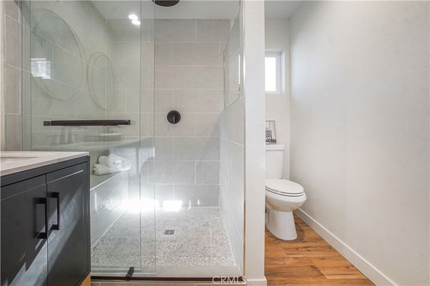 Bathroom, Glass Shower, Interior, Recessed Lighting, Wood Texture Flooring
