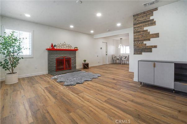 Dining room, Fireplace, Interior, Pendant Lights, Recessed Lighting, Wood Texture Flooring