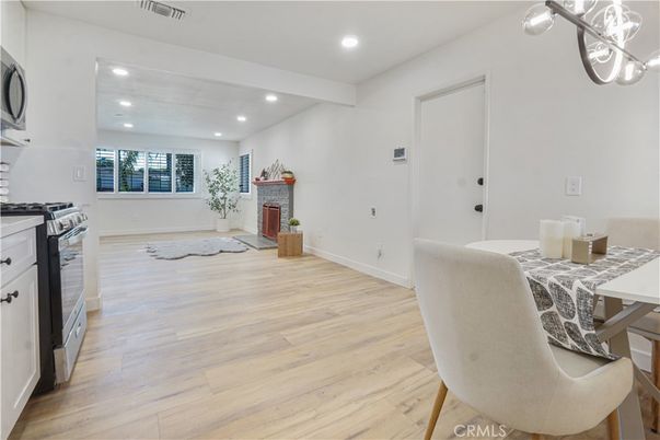 Fireplace, Interior, Kitchen, Recessed Lighting, Wood Texture Flooring