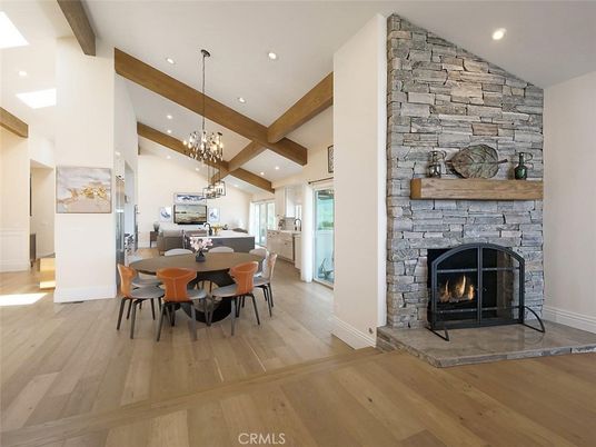 Chandelier, Dining room, Fireplace, Interior, Kitchen, Pendant Lights, Recessed Lighting, Stone Walls, Wooden Beams, Wood Texture Flooring