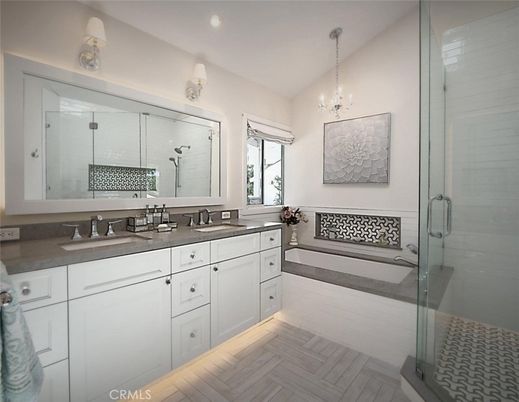 Bathroom, Chandelier, Dual Sink Vanities, Glass Shower, Interior, Wood Texture Flooring
