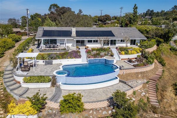 Exterior, Pool, Solar Panels