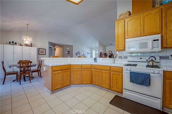 Chandelier, Dining room, Interior, Kitchen, Pendant Lights, Tile Countertops