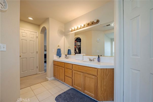 Bathroom, Dual Sink Vanities, Interior, Recessed Lighting, Tile Countertops