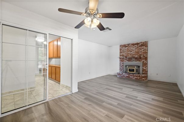 Empty room, Fireplace, Interior, Stone Walls, Wood Texture Flooring