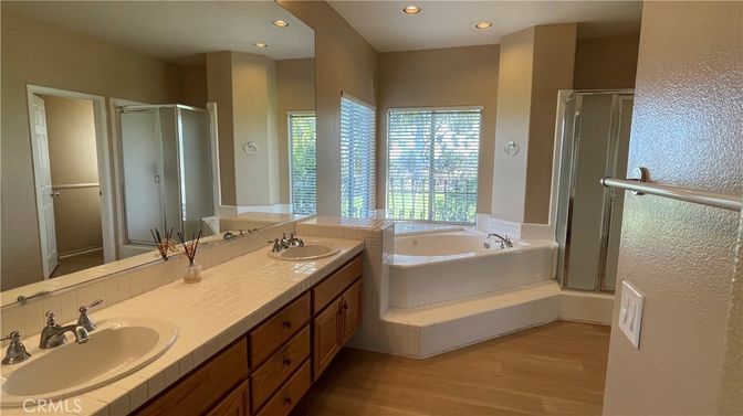 Bathroom, Dual Sink Vanities, Interior, Recessed Lighting, Tile Countertops, Wood Texture Flooring