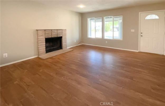 Empty room, Fireplace, Interior, Recessed Lighting, Wood Texture Flooring
