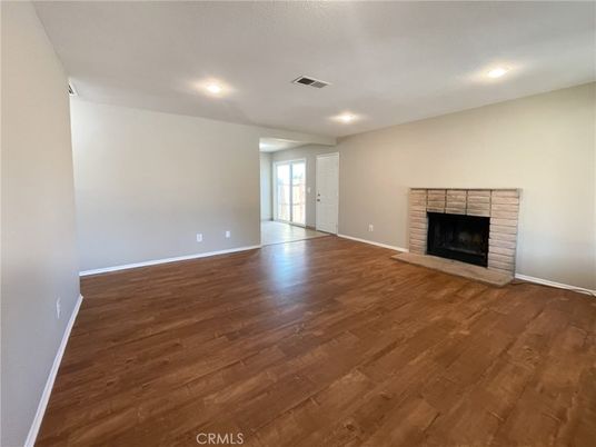 Empty room, Fireplace, Interior, Recessed Lighting, Wood Texture Flooring