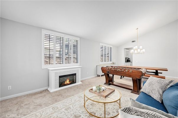 Chandelier, Fireplace, Game Room, Interior, Living room, Pendant Lights