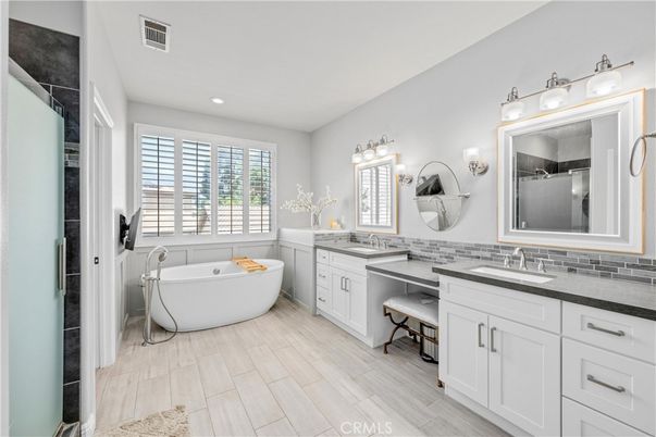Bathroom, Dual Sink Vanities, Free Standing Baths, Interior, Recessed Lighting, Wood Texture Flooring