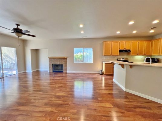 Empty room, Fireplace, Interior, Kitchen, Recessed Lighting, Wood Texture Flooring