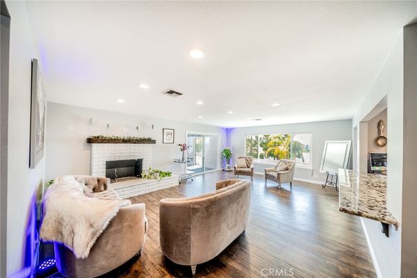 Fireplace, Interior, Living room, Recessed Lighting, Wood Texture Flooring