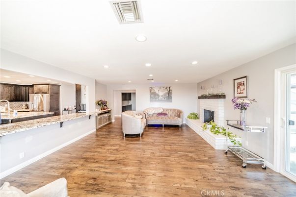 Fireplace, Interior, Kitchen, Living room, Recessed Lighting, Wood Texture Flooring