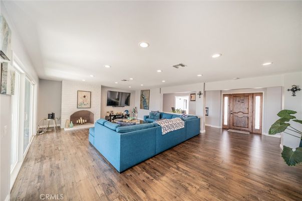 Fireplace, Interior, Living room, Recessed Lighting, Wood Texture Flooring