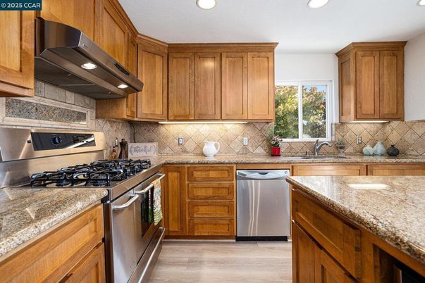 Interior, Kitchen, Recessed Lighting, Stainless Steel Appliances, Wood Texture Flooring