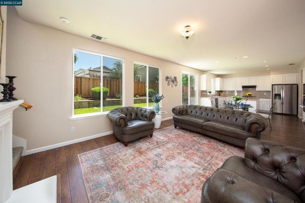 Fireplace, Interior, Kitchen, Living room, Recessed Lighting, Stainless Steel Appliances, Wood Texture Flooring