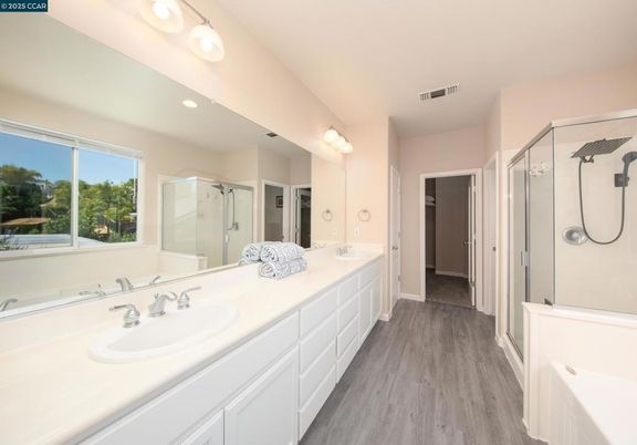 Bathroom, Dual Sink Vanities, Glass Shower, Interior, Recessed Lighting, Wood Texture Flooring