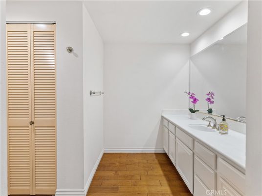 Bathroom, Dual Sink Vanities, Interior, Recessed Lighting, Wood Texture Flooring