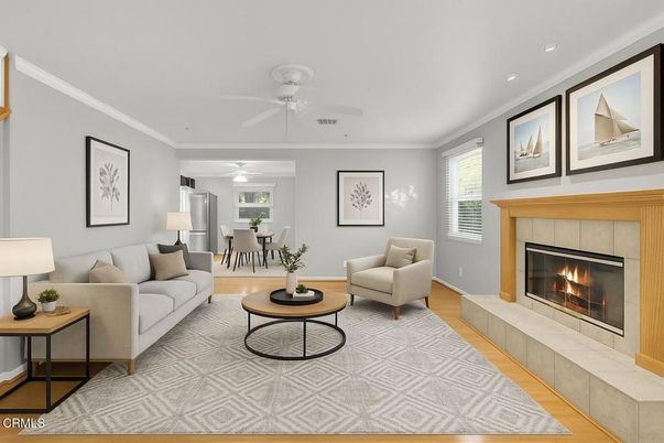 Dining room, Fireplace, Interior, Living room, Recessed Lighting, Wood Texture Flooring
