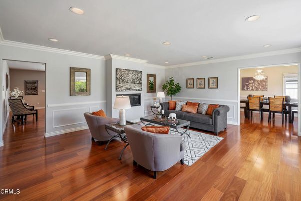 Dining room, Fireplace, Interior, Living room, Recessed Lighting, Wood Texture Flooring