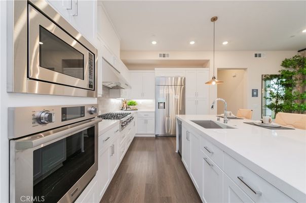 Interior, Kitchen, Pendant Lights, Recessed Lighting, Stainless Steel Appliances, Wood Texture Flooring