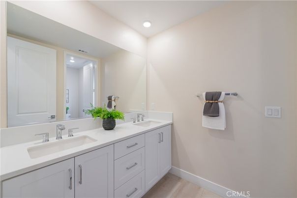 Bathroom, Dual Sink Vanities, Interior, Recessed Lighting, Wood Texture Flooring