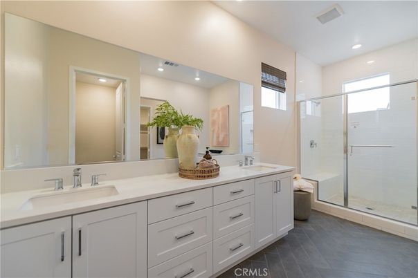 Bathroom, Dual Sink Vanities, Glass Shower, Interior, Recessed Lighting, Wood Texture Flooring