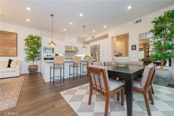 Dining room, Interior, Kitchen, Pendant Lights, Recessed Lighting, Stainless Steel Appliances, Wood Texture Flooring