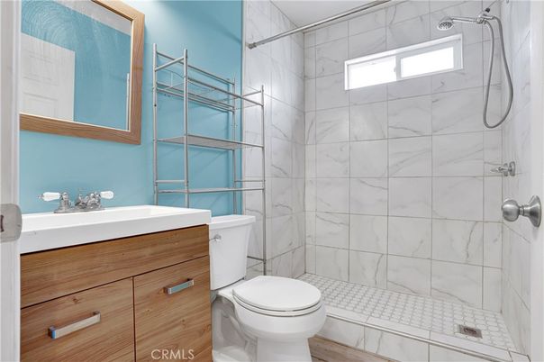 Bathroom, Glass Shower, Interior, Marble Walls, Wood Texture Flooring