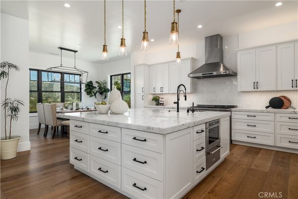 Dining room, Interior, Kitchen, Pendant Lights, Recessed Lighting, Stainless Steel Appliances, Wood Texture Flooring