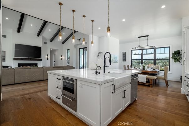 Dining room, Fireplace, Interior, Kitchen, Living room, Pendant Lights, Recessed Lighting, Stainless Steel Appliances, Wooden Beams, Wood Texture Flooring