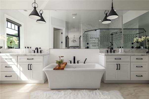 Bathroom, Dual Sink Vanities, Free Standing Baths, Glass Shower, Interior, Marble, Marble Walls, Pendant Lights, Recessed Lighting