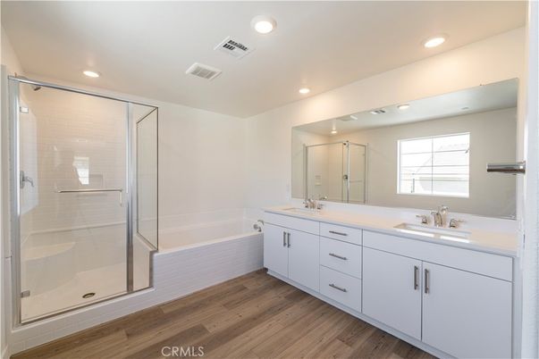 Bathroom, Dual Sink Vanities, Glass Shower, Interior, Recessed Lighting, Wood Texture Flooring