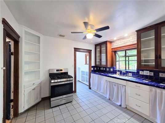 Interior, Kitchen, Recessed Lighting, Stainless Steel Appliances, Tile Countertops