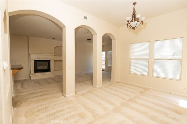 Chandelier, Empty room, Fireplace, Interior