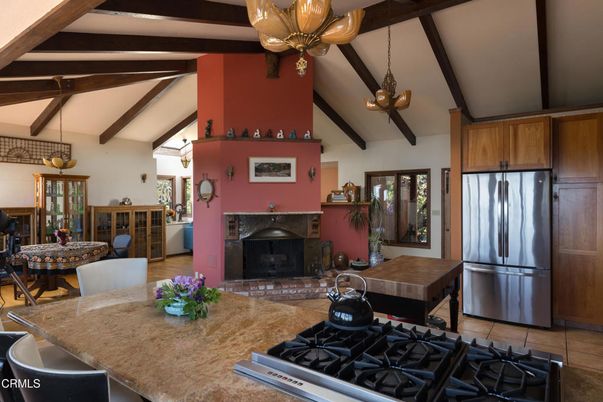 Chandelier, Dining room, Fireplace, Interior, Kitchen, Pendant Lights, Wooden Beams